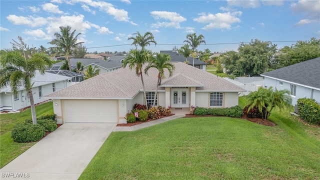3708 SW 2nd Ln, Cape Coral, FL 33991 - view of front of property featuring french doors, an attached garage, stucco siding, and a front yard