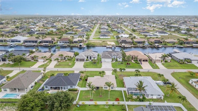 3708 SW 2nd Ln, Cape Coral, FL 33991 - aerial view of property and surrounding area with nearby suburban area and a nearby body of water