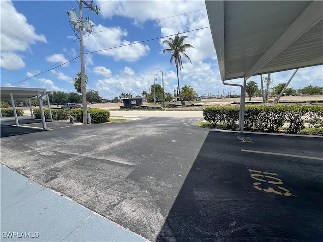 632 Victoria Dr Unit 103, Cape Coral, FL 33904 - view of covered parking lot