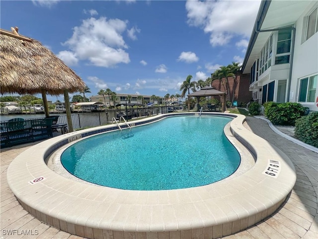 632 Victoria Dr Unit 103, Cape Coral, FL 33904 - community pool featuring a gazebo and a water view