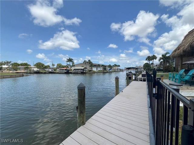 632 Victoria Dr Unit 103, Cape Coral, FL 33904 - dock area featuring a water view