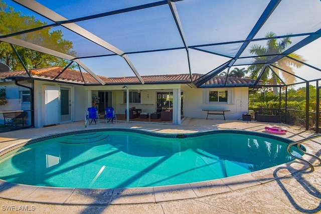 67 Pebble Beach Blvd, Naples, FL 34113 - swimming pool featuring a patio area and a lanai