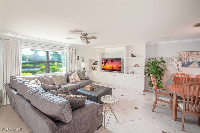 67 Pebble Beach Blvd, Naples, FL 34113 - living room featuring crown molding, light tile patterned floors, a ceiling fan, and built in features