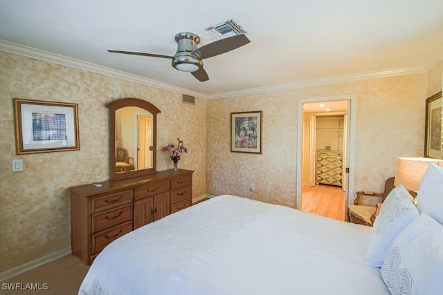 67 Pebble Beach Blvd, Naples, FL 34113 - bedroom with ornamental molding, wallpapered walls, baseboards, ensuite bath, and ceiling fan