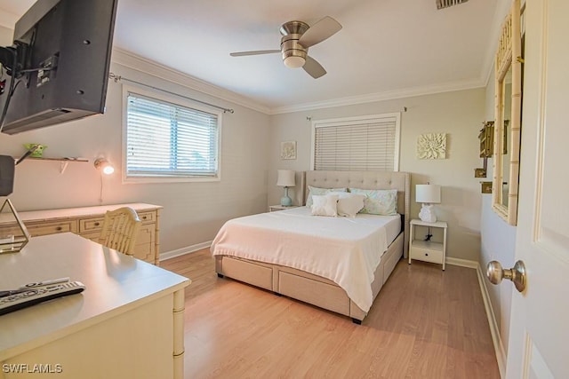 67 Pebble Beach Blvd, Naples, FL 34113 - bedroom featuring crown molding, light wood finished floors, baseboards, and a ceiling fan