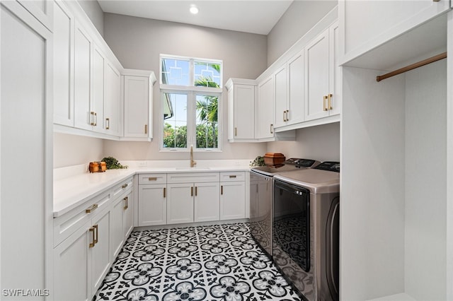 493 Myrtle Rd, Naples, FL 34108 - laundry room with washing machine and clothes dryer, cabinet space, and recessed lighting
