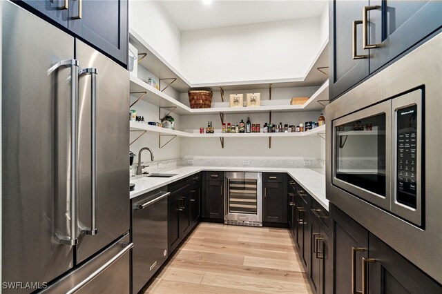 493 Myrtle Rd, Naples, FL 34108 - storage area with wine cooler and a sink