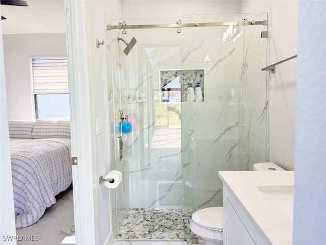 1719 NW 15th St, Cape Coral, FL 33993 - ensuite bathroom with a marble finish shower, toilet, vanity, and marble finish flooring