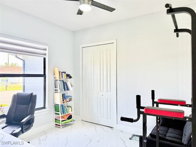 1719 NW 15th St, Cape Coral, FL 33993 - office space with baseboards, plenty of natural light, a ceiling fan, and marble look tile flooring