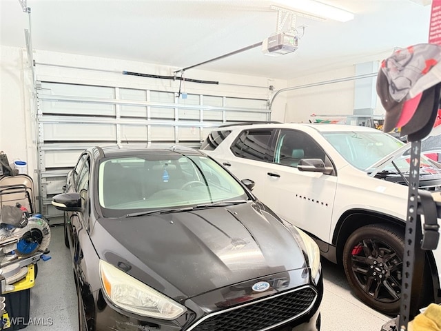 1719 NW 15th St, Cape Coral, FL 33993 - garage featuring a garage door opener