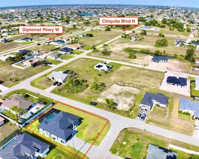 1719 NW 15th St, Cape Coral, FL 33993 - aerial view of residential area featuring property parcel outlined