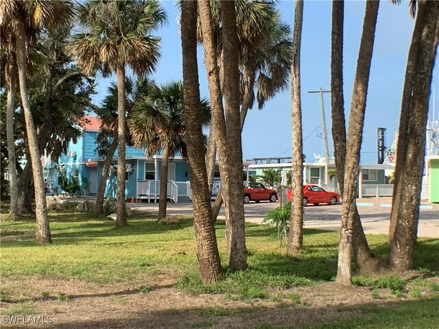 1180 Main St Unit 6, Fort Myers Beach, FL 33931 - view of grassy yard