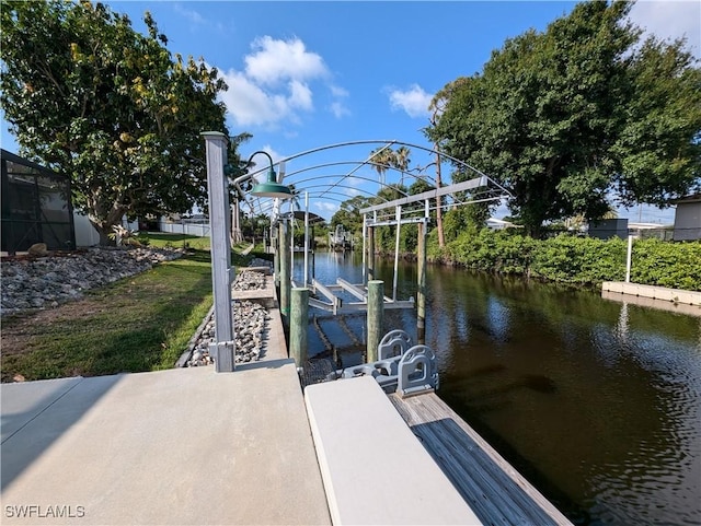11397 Argentine Ct, Bokeelia, FL 33922 - dock area with boat lift and a water view
