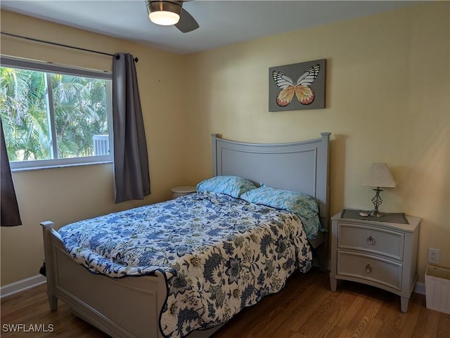 11397 Argentine Ct, Bokeelia, FL 33922 - bedroom featuring wood finished floors and a ceiling fan