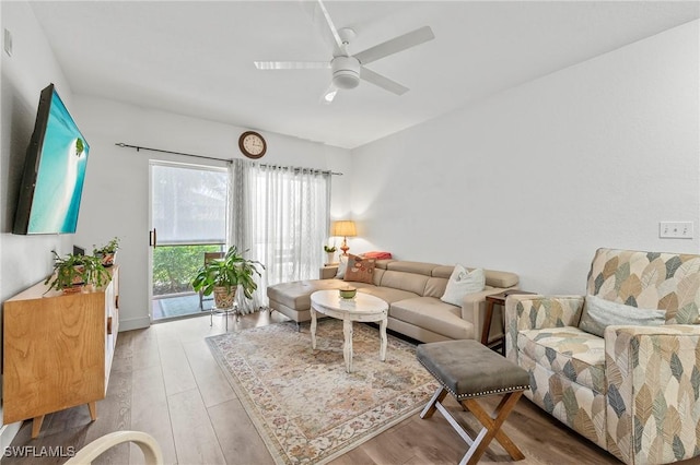 27111 Matheson Ave Unit 103, Bonita Springs, FL 34135 - living area featuring wood finished floors and a ceiling fan