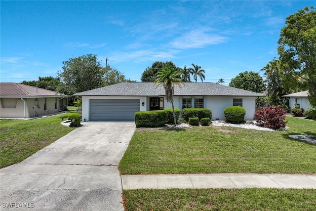 3822 Palm Tree Blvd, Cape Coral, FL 33904 - ranch-style house with an attached garage, driveway, stucco siding, and a front lawn