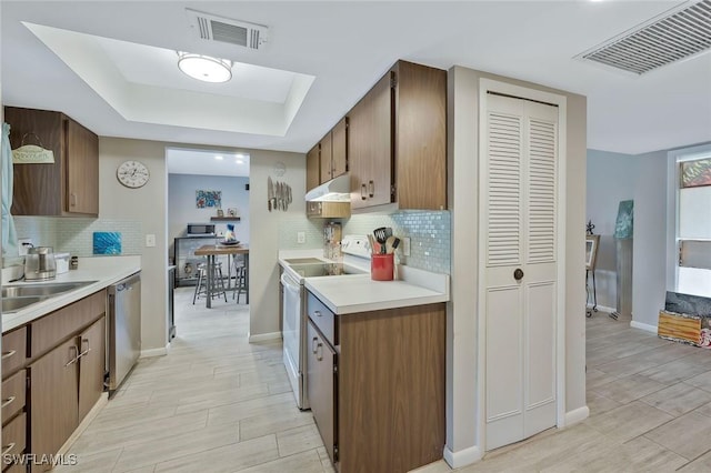 3822 Palm Tree Blvd, Cape Coral, FL 33904 - kitchen featuring white electric range, stainless steel dishwasher, under cabinet range hood, light countertops, and baseboards
