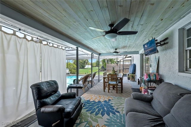 3822 Palm Tree Blvd, Cape Coral, FL 33904 - view of patio with an outdoor pool, ceiling fan, and glass enclosure