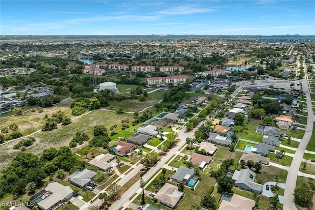 3822 Palm Tree Blvd, Cape Coral, FL 33904 - aerial view of property and surrounding area featuring nearby suburban area and a nearby body of water