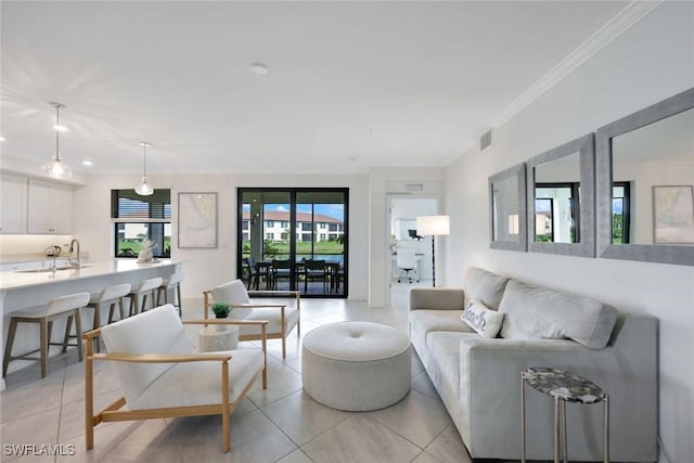12003 Hawthorn Lake Dr Unit 101, Fort Myers, FL 33913 - living area featuring light tile patterned flooring, recessed lighting, and crown molding