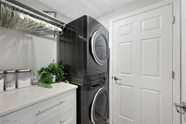 12003 Hawthorn Lake Dr Unit 101, Fort Myers, FL 33913 - laundry room with stacked washer and clothes dryer