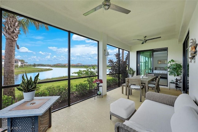 12003 Hawthorn Lake Dr Unit 101, Fort Myers, FL 33913 - sunroom featuring a ceiling fan, a water view, and outdoor lounge area