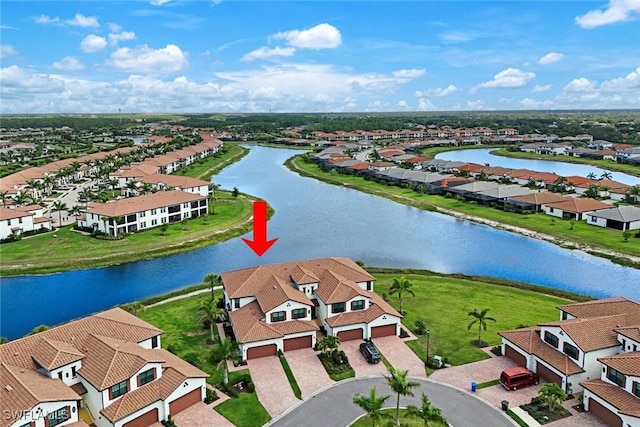 12003 Hawthorn Lake Dr Unit 101, Fort Myers, FL 33913 - aerial perspective of suburban area with a nearby body of water