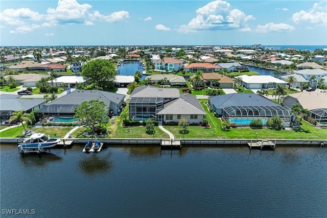 414 Caicos Dr, Punta Gorda, FL 33950 - aerial perspective of suburban area featuring a large body of water