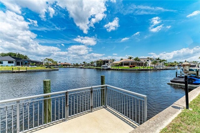 414 Caicos Dr, Punta Gorda, FL 33950 - dock with a water view and a residential view