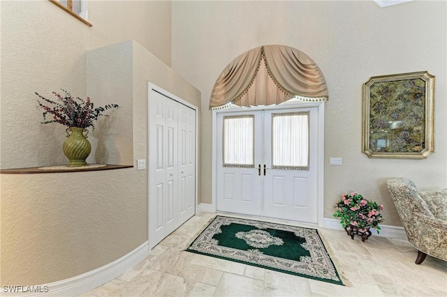 414 Caicos Dr, Punta Gorda, FL 33950 - foyer with baseboards and a textured wall