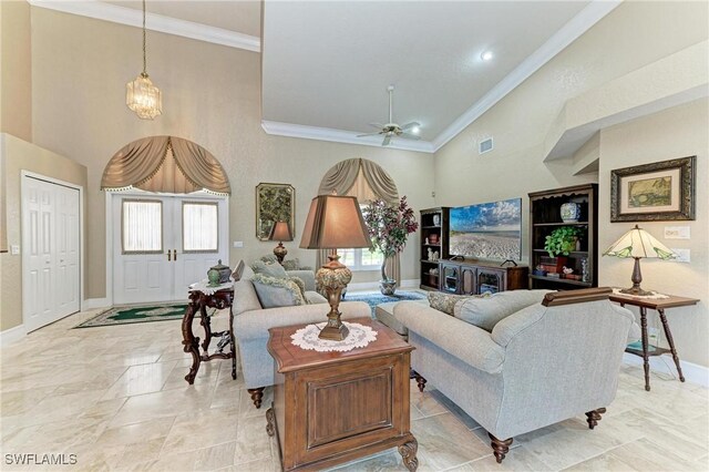 414 Caicos Dr, Punta Gorda, FL 33950 - living area with high vaulted ceiling, crown molding, baseboards, and a ceiling fan