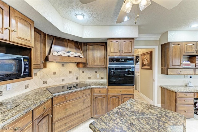414 Caicos Dr, Punta Gorda, FL 33950 - kitchen with black appliances, range hood, a textured ceiling, backsplash, and a ceiling fan
