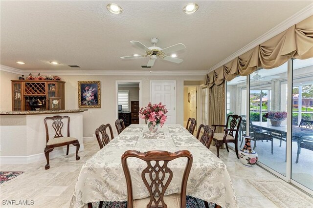 414 Caicos Dr, Punta Gorda, FL 33950 - dining area featuring ornamental molding, baseboards, recessed lighting, a ceiling fan, and a textured ceiling