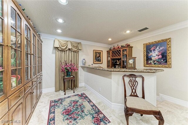 414 Caicos Dr, Punta Gorda, FL 33950 - indoor dry bar with recessed lighting, a textured ceiling, crown molding, and light marble finish floors