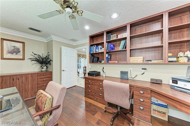 414 Caicos Dr, Punta Gorda, FL 33950 - office space with a textured ceiling, ceiling fan, dark wood finished floors, crown molding, and recessed lighting