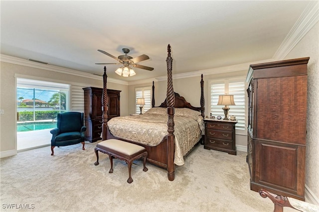 414 Caicos Dr, Punta Gorda, FL 33950 - bedroom with access to exterior, light colored carpet, ornamental molding, baseboards, and ceiling fan