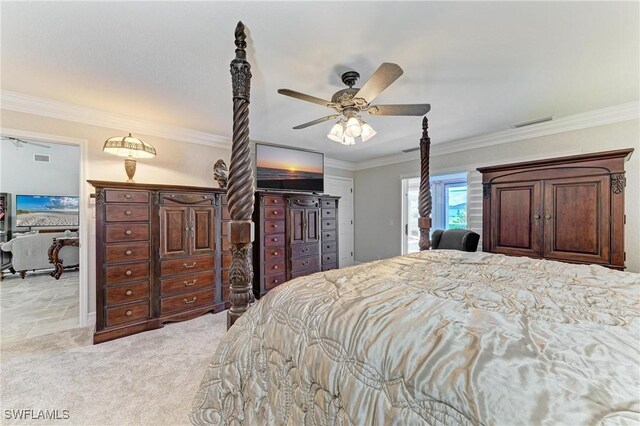 414 Caicos Dr, Punta Gorda, FL 33950 - bedroom with ornamental molding, light carpet, and ceiling fan
