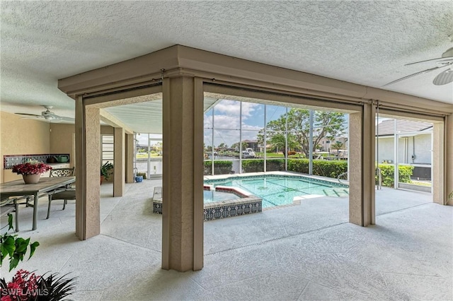 414 Caicos Dr, Punta Gorda, FL 33950 - view of pool featuring a ceiling fan, a patio area, a lanai, and a pool with connected hot tub