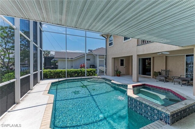 414 Caicos Dr, Punta Gorda, FL 33950 - view of swimming pool with a patio area, a lanai, a pool with connected hot tub, and a ceiling fan