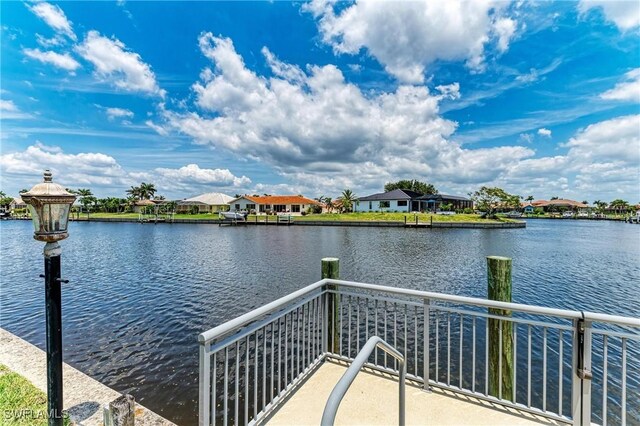 414 Caicos Dr, Punta Gorda, FL 33950 - dock with a water view and a residential view