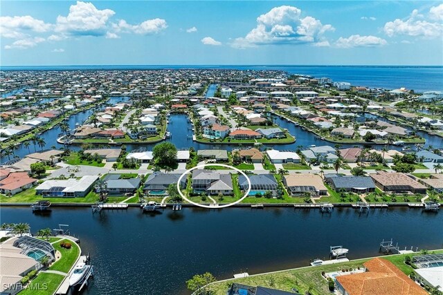 414 Caicos Dr, Punta Gorda, FL 33950 - aerial view of residential area with a large body of water
