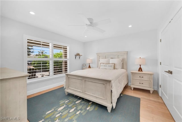 523 107th Ave N, Naples, FL 34108 - bedroom with light wood-type flooring, recessed lighting, and ceiling fan