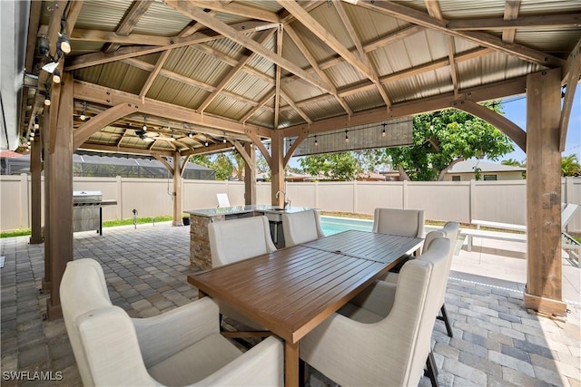 523 107th Ave N, Naples, FL 34108 - fenced backyard with a gazebo, a patio, and outdoor dining area