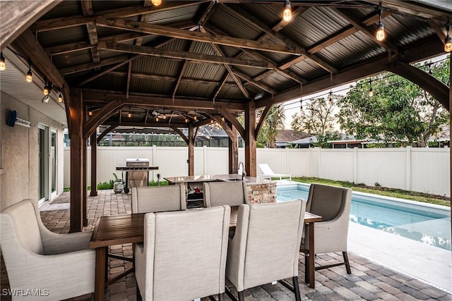 523 107th Ave N, Naples, FL 34108 - fenced backyard with a gazebo and a patio