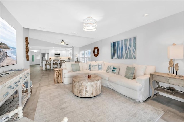 523 107th Ave N, Naples, FL 34108 - living area featuring a ceiling fan and lofted ceiling