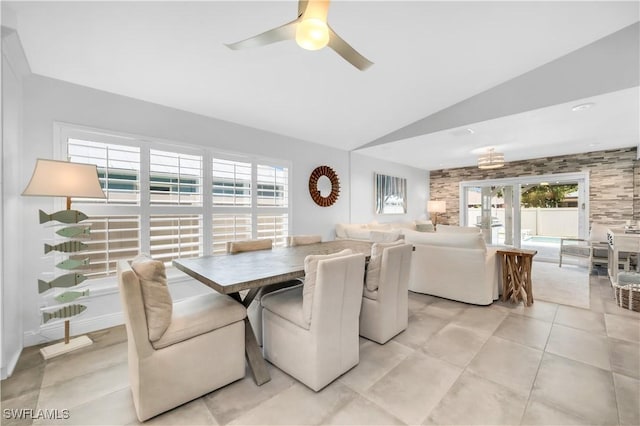 523 107th Ave N, Naples, FL 34108 - dining space featuring vaulted ceiling, ceiling fan, and light tile patterned flooring