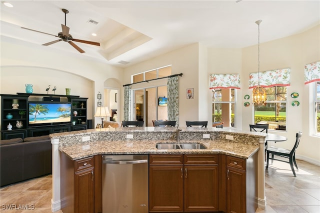 6492 Caldecott Dr, Naples, FL 34113 - kitchen featuring open floor plan, dishwasher, a sink, and decorative light fixtures
