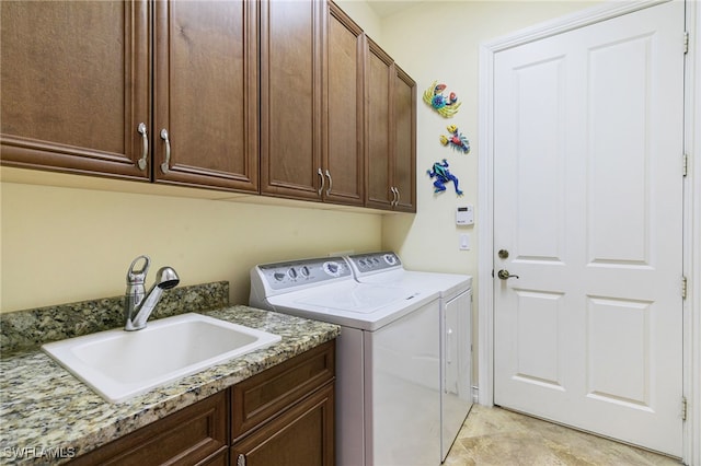 6492 Caldecott Dr, Naples, FL 34113 - laundry room with independent washer and dryer and cabinet space