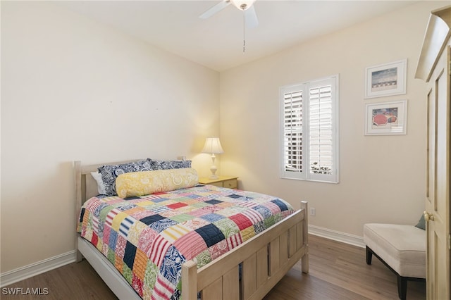6492 Caldecott Dr, Naples, FL 34113 - bedroom featuring baseboards, dark wood-style floors, and a ceiling fan