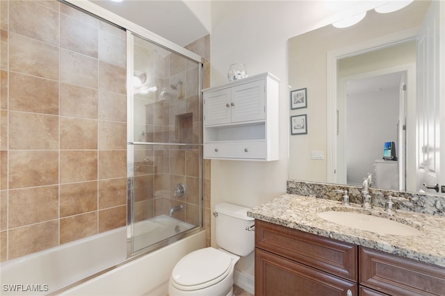 6492 Caldecott Dr, Naples, FL 34113 - bathroom with toilet, vanity, and enclosed tub / shower combo